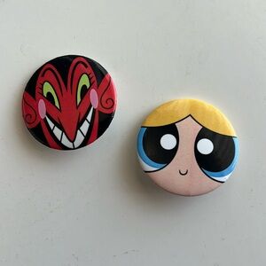Bubbles and his infernal majesty button pins from comic con.